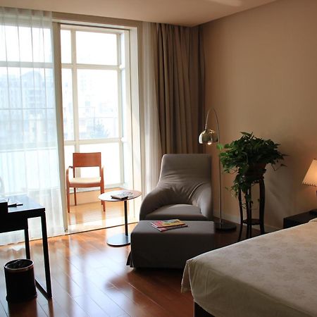 Green Park Hotel Tianjin Binhai  Rum bild