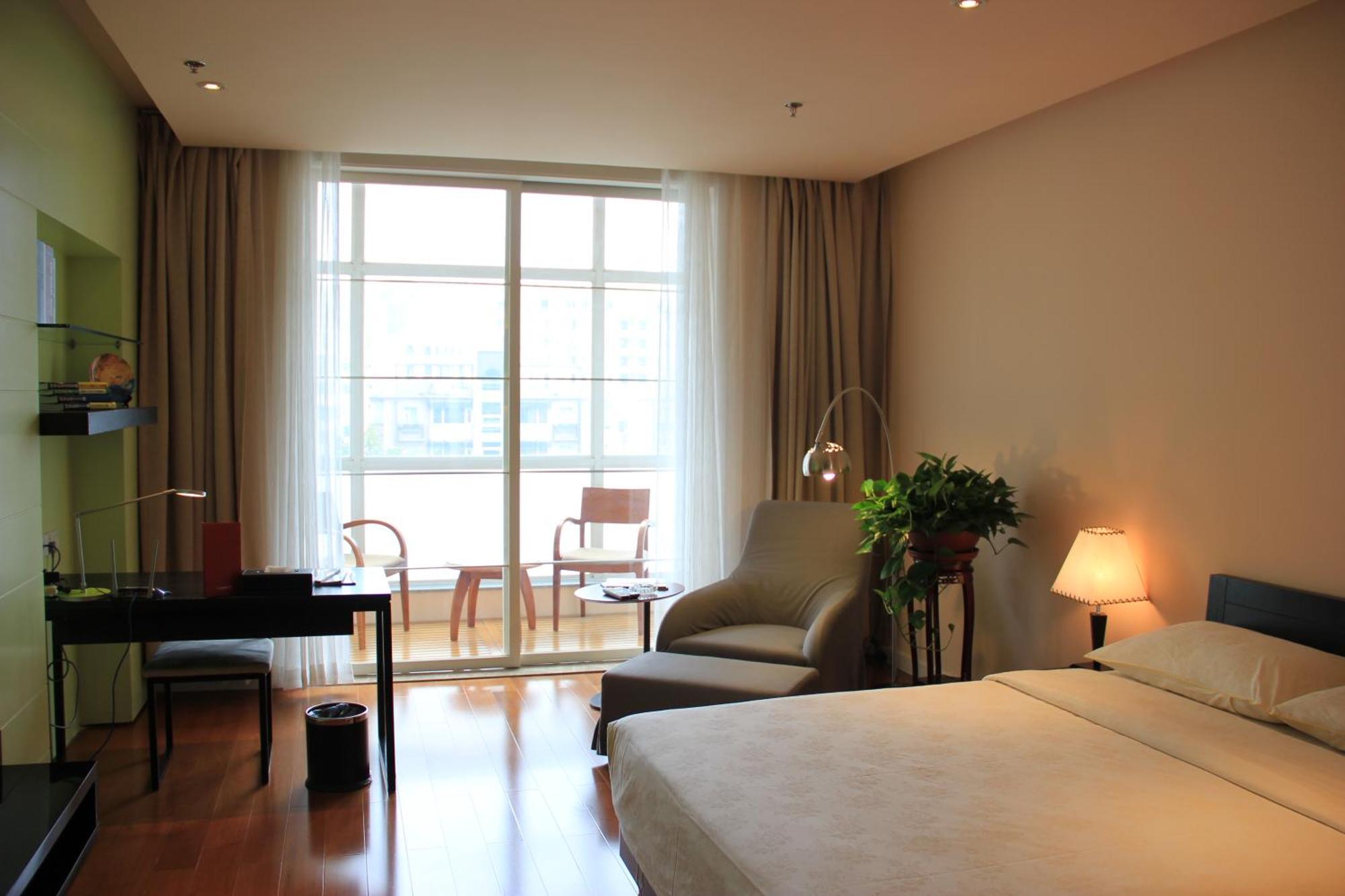 Green Park Hotel Tianjin Binhai  Rum bild