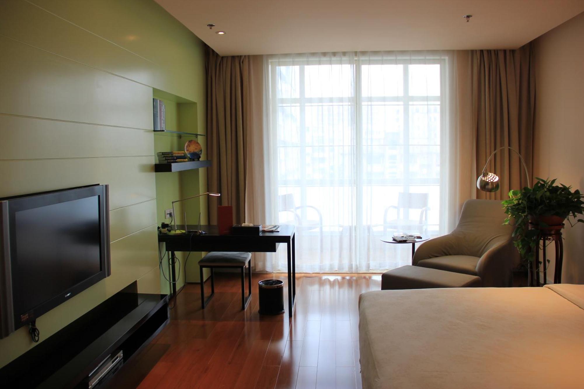 Green Park Hotel Tianjin Binhai  Rum bild